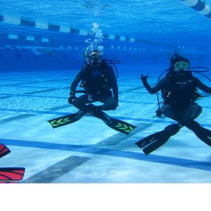 Divemaster demonstrating mastery of buoyancy