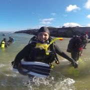 Happy Beach Diver exiting the water